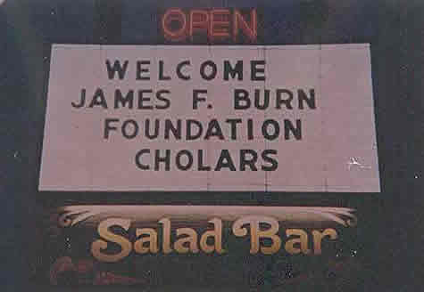 A sign welcomes the burn cholars.