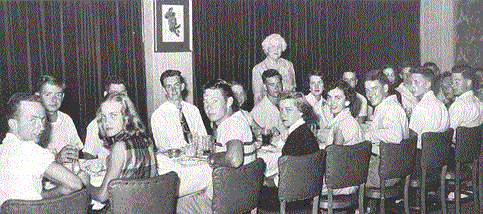 Mom Byrnes, standing, at lunch in 1951 with a group of Byrnes Scholars.